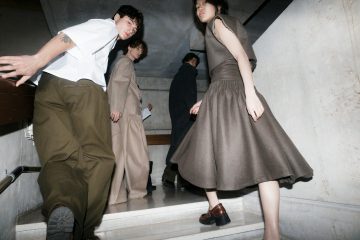 People are descending a staircase together.