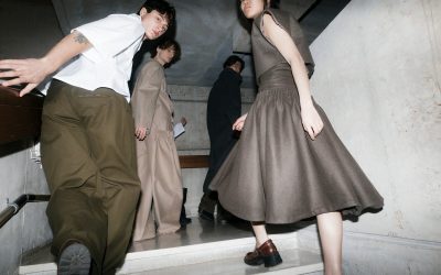 People are descending a staircase together.